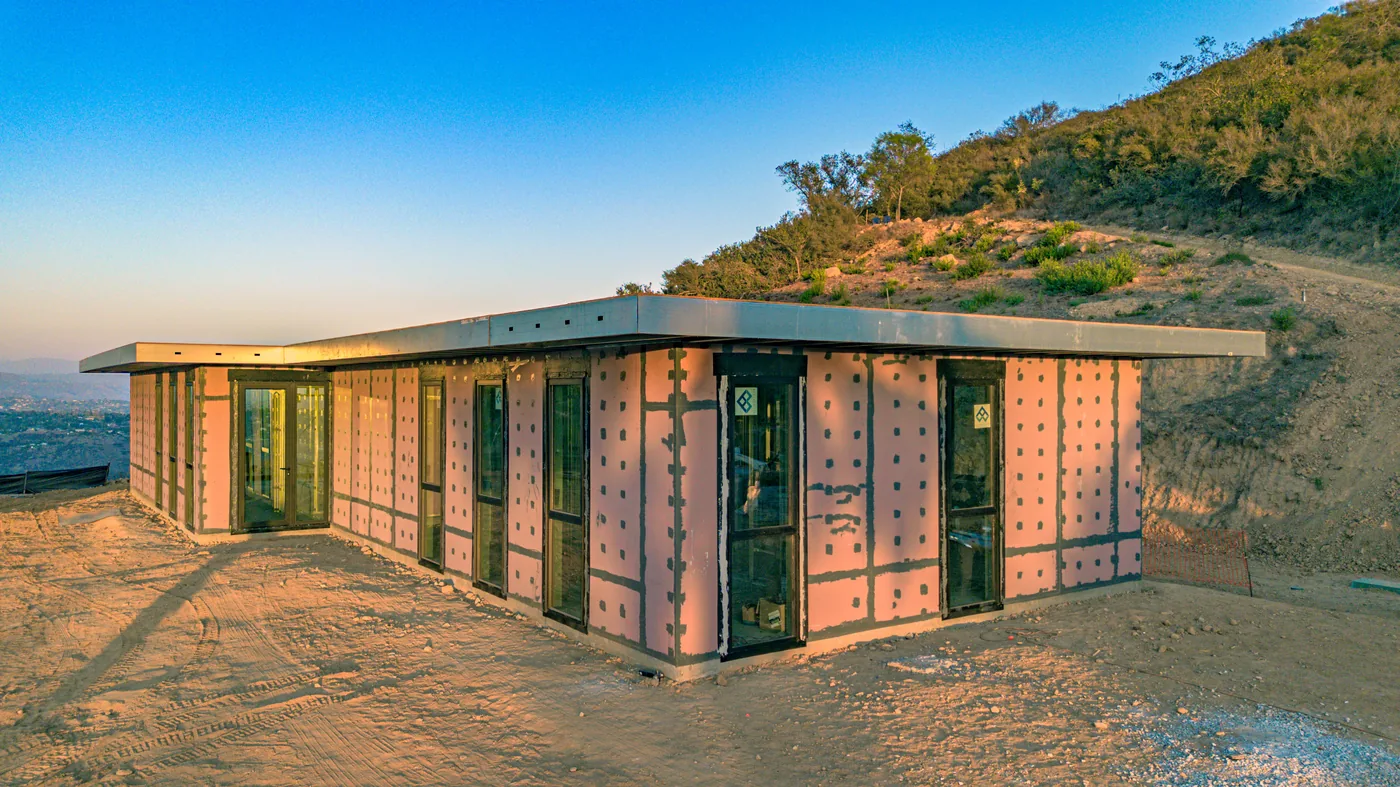 Escondido Residence exterior with All Weather aluminum-framed windows and doors along the SAFE wall panels
