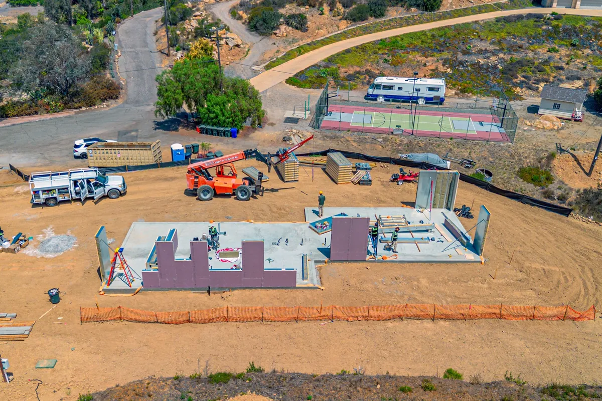 Aerial view of crews installing 4C SAFE wall panels on a slab in Escondido, California